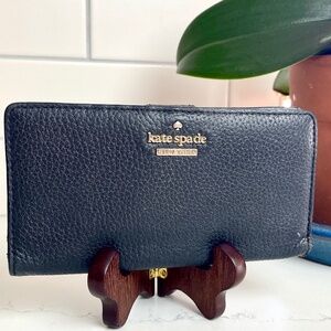 “kate spade” slim black Pebbled Leather bi-fold wallet